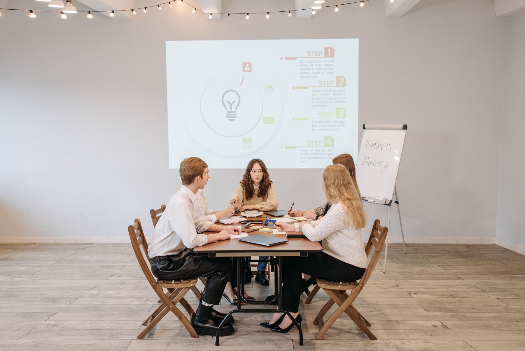 Representative service and operations team reviewing a customer workflow