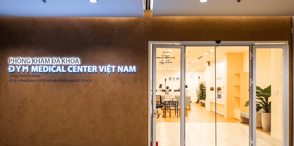 Entrance to DYM Medical Center Vietnam, with the clinic reception visible inside