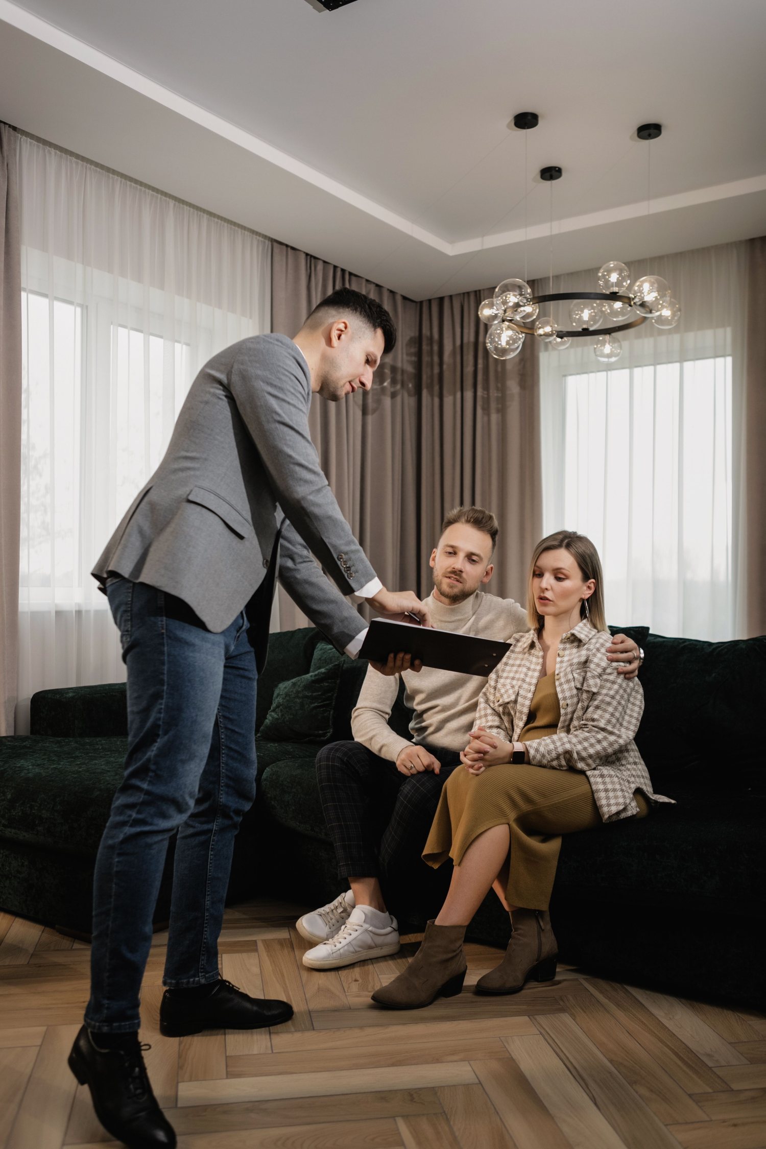 Property professionals reviewing transaction documents together